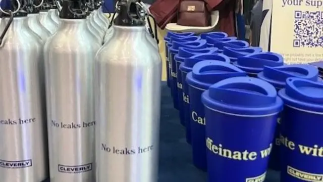 James Cleverly merch, water bottles saying 'No leaks here' and coffee cups saying 'caffeinate with Cleverly"