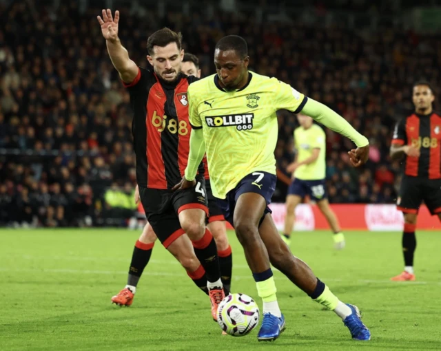 Joe Aribo in action with AFC Bournemouth's Lewis Cook