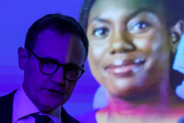 Conservative Party MP and leadership candidate Tom Tugendhat attends a hosting event, in front of a picture of Kemi Badenoch, Conservative Party MP and leadership candidate, during the Britain's Conservative Party's annual conference in Birmingham, Britain, September 29, 2024.