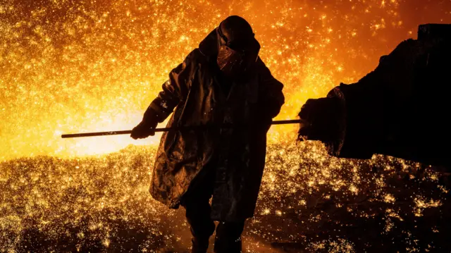 Steelworker at blast furnace