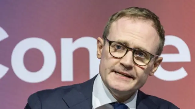 Close up of Tugendhat wearing glasses as he answers questions on stage