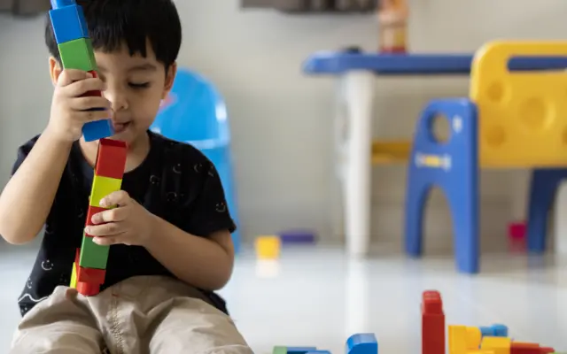 Child playing with blocks