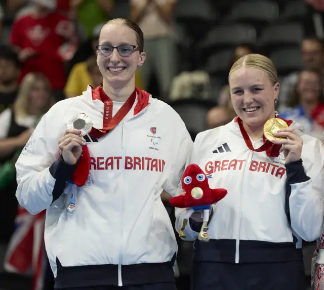 Faye Rogers and Callie-Ann Warrington on the podium with their Paralympic medals