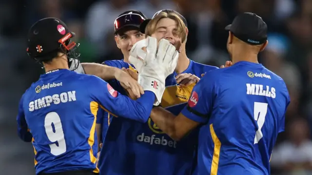 Sussex celebrate taking wicket