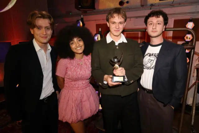 Nicholas Eden, Lily Fontaine, Douglas Frost and Lewis Whiting of English Teacher after winning the Mercury Music Prize at the Mercury Music Awards 2024 at Abbey Road Studios on September 05, 2024 in London, England