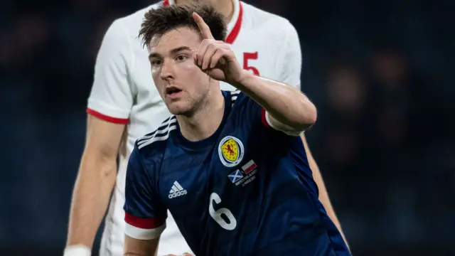 Kieran Tierney celebrates against Poland