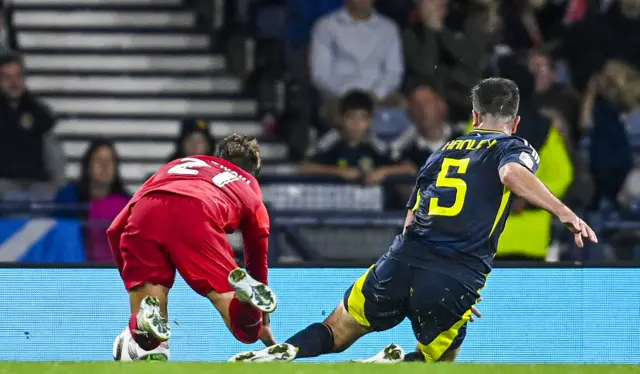 Grant Hanley's clumsy challenge gifted Poland a second penalty