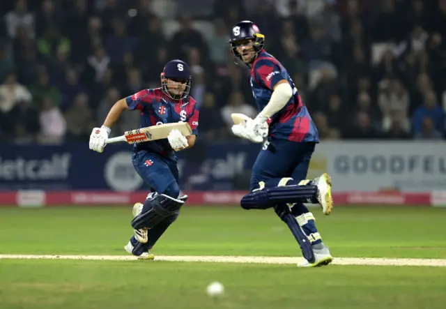 Ricardo Vasconcelos (L) and David Willey of Northamptonshire Steelbacks run between the wicket