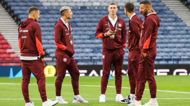 Poland players arrive at Hampden