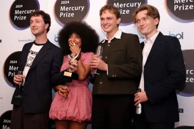 Lewis Whiting, Lily Fontaine, Douglas Frost and Nicholas Eden of English Teacher after winning the Mercury Music Prize at the Mercury Music Awards 2024 at Abbey Road Studios on September 05, 2024 in London, England.