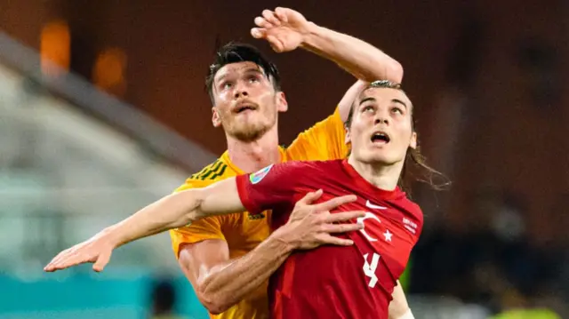 Kieffer Moore of Wales battles for the ball with Caglar Soyuncu of Turkeyat Euro 2020