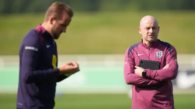 Lee Carsley and Harry Kane in training