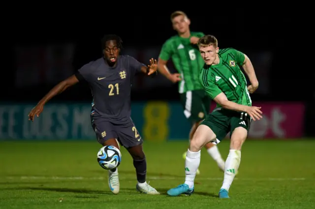 Terry Devlin and Jamie Bynoe-Gittens battling for the ball during the 0-0 draw