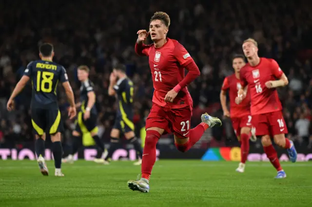 Nicola Zalewski celebrates scoring Poland's winner