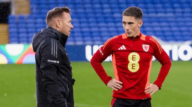 Craig Bellamy speaks to Harry Wilson in training