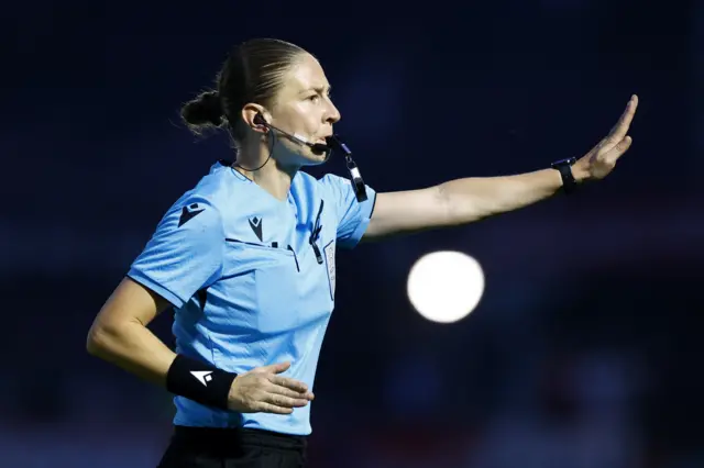 Referee waves away a decision