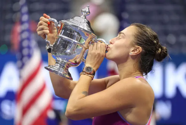 Aryna Sabalenka kisses the US Open title