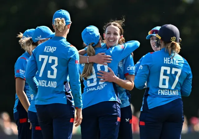 Kate Cross celebrates a wicket against Ireland