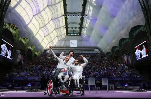 Piers Gilliver, Dimitri Coutya and Oliver Lam-Watson celebrate their bronze