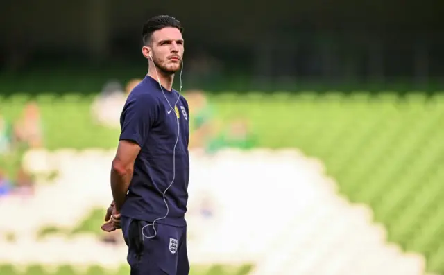 Declan Rice surveys the pitch before the game