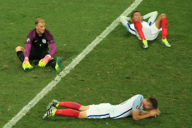 England players are dejected at the final whistle