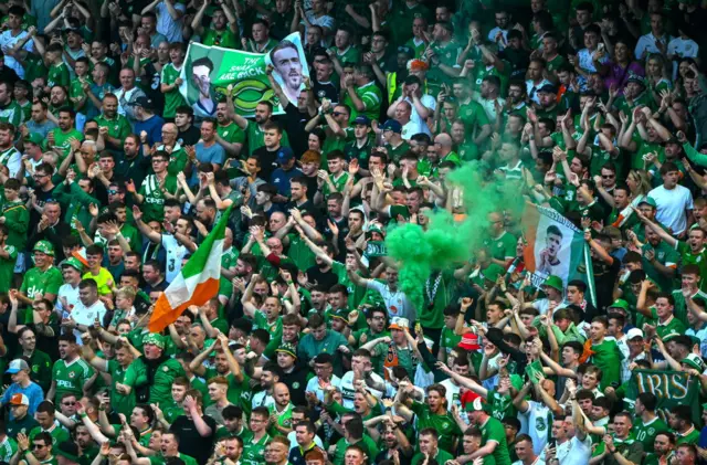 Ireland fans sing fervently in the stands