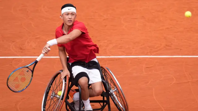 Tokito Oda hits a forehand