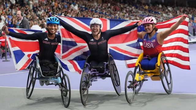 Hannah Cockroft and Kare Adenegan celebrate their medals