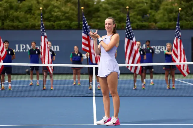 Mika Stojsavljevic holds the US Open girls' trophy