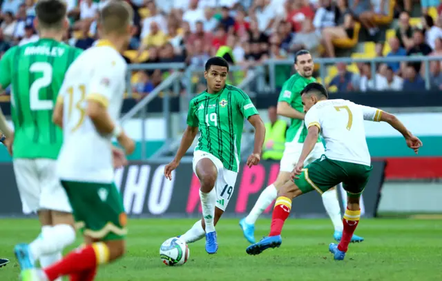 Northern Ireland's Shea Charles with Bulgaria's Ivan Minchev