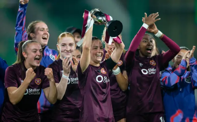 Hearts players lift the capital cup