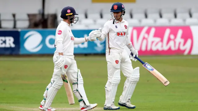 Dean Elgar and Robin Das walk out to bat for Essex during Essex CCC vs Nottinghamshire CCC,