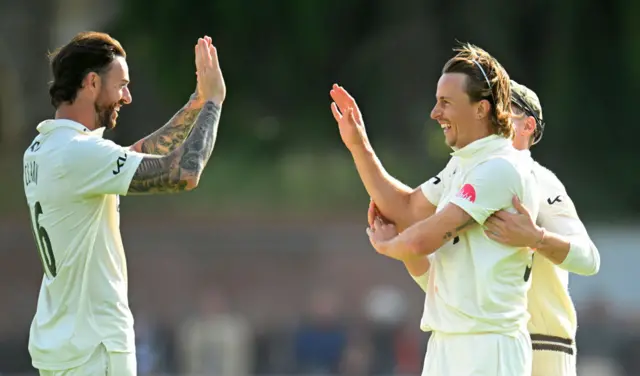 Tom Curran of Surrey celebrates the wicket of James Rew of Somerset