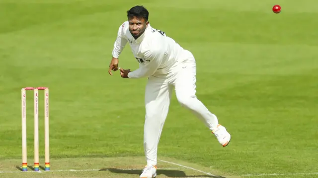 Shakib Al Hasan of Surrey CC in bowling action