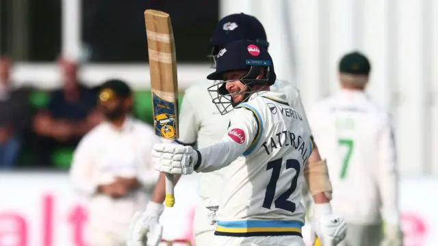 Jonny Tattersall celebrates hitting a 50 for Yorkshire