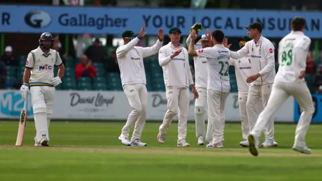 Adam Lyth is caught behind off the bowling of Ian Holland