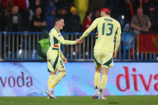 Harry Wilson and Kieffer Moore celebrate