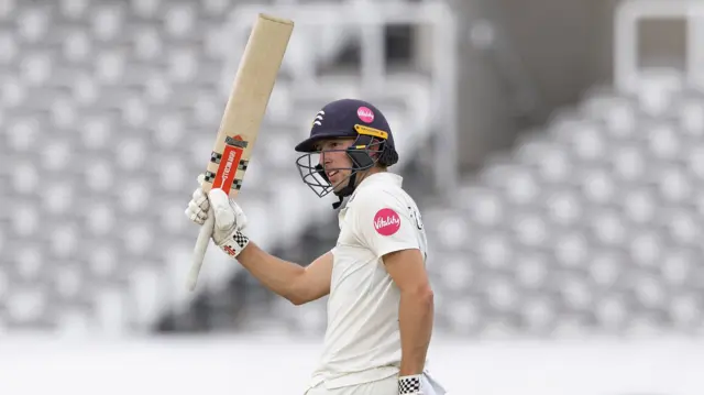 Josh De Caires, Middlesex CCC, acknowledges his 50