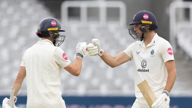 Jack Davies and Josh De Caires bump fists