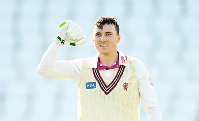 Tom Banton celebrates his 100