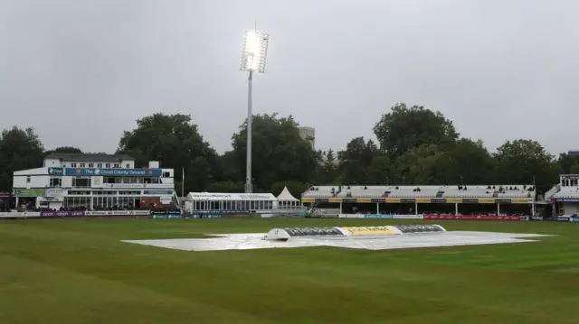 The covers are on as rain delays the start of play during Essex CCC vs Nottinghamshire CCC