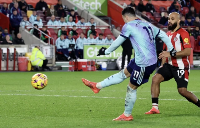 Arsenal's Gabriel Martinelli scores their third goal