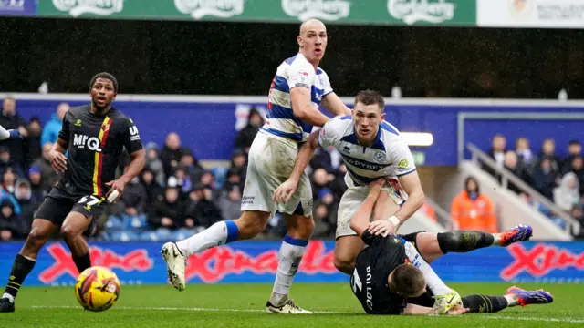 Jimmy Dunne heads QPR's second goal against Watford
