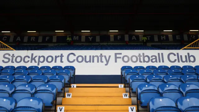Steps leading to a sign that says Stockport County Football Club at Edgeley Park