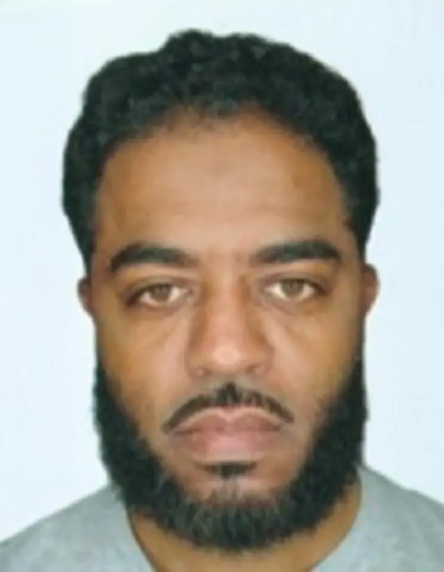 A passport photo of Shamsud-Din Jabbar