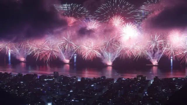 Fireworks explode over Copacabana beach to celebrate the New Year in Rio de Janeiro, Brazil