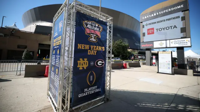 A sign outside the Superdome reads "Allstate sugar bowl new years day"