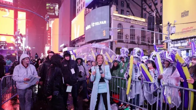 Rita Ora attends the New Year celebrations in the rain, on New Year's Eve in New York City