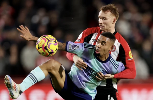 Arsenal's Gabriel Jesus in action with Brentford's Sepp van den Berg