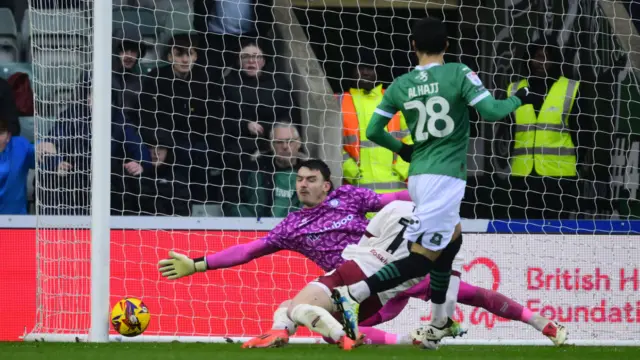 Rami Al Hajj finishes past Bristol City goalkeeper Max O'Leary